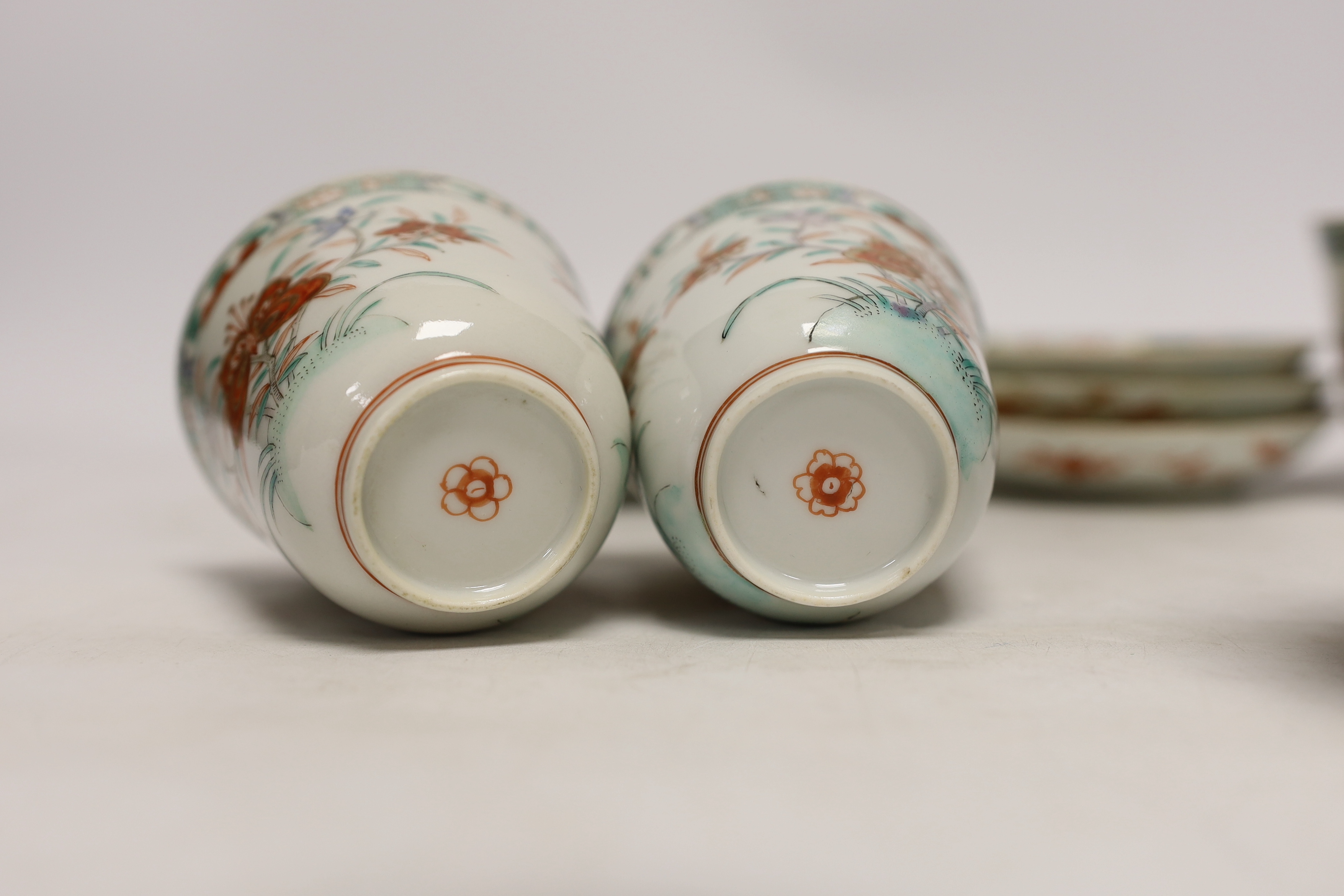 A set of six early 18th century Chinese cups and saucers with Dutch enamelled decoration, c.1710, 7.5cm high